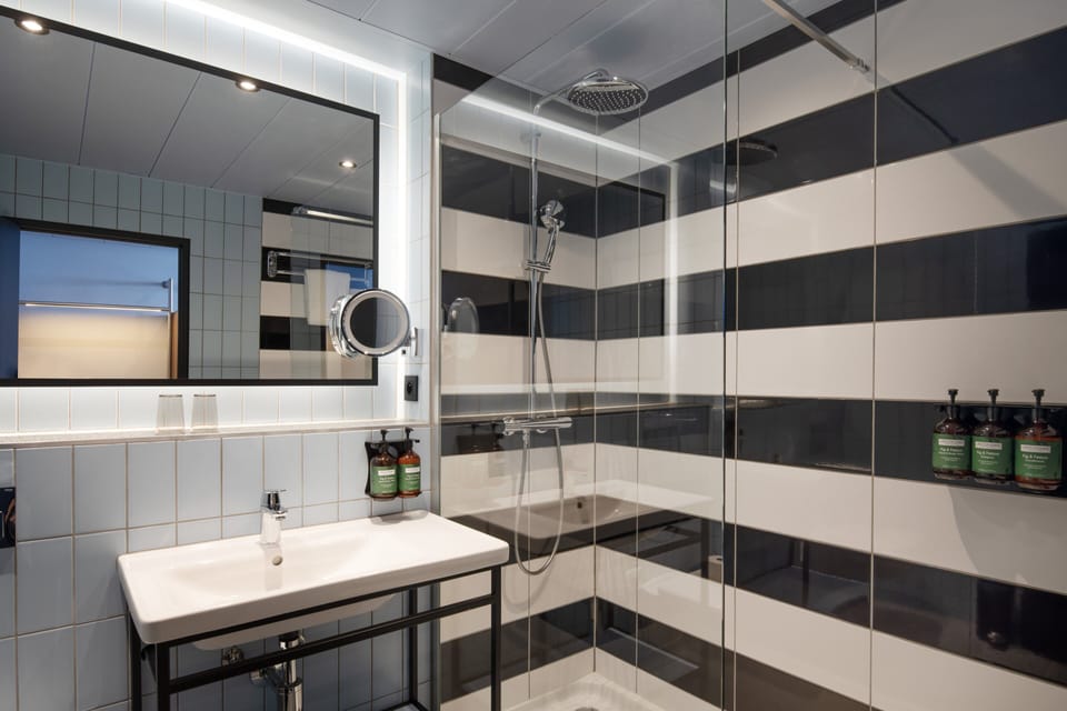 Hair dryer, towels, soap, shampoo