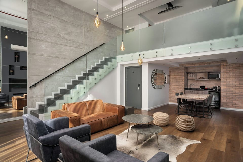 Loft, 1 Bedroom | Lounge | Serves breakfast, lunch, and dinner