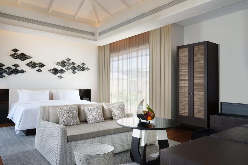 Grand Pool Villa | Minibar, in-room safe, desk, blackout drapes