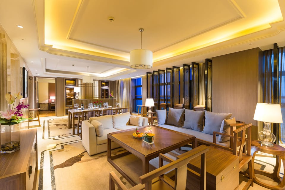 Deluxe Suite, City View | Premium bedding, minibar, in-room safe, desk