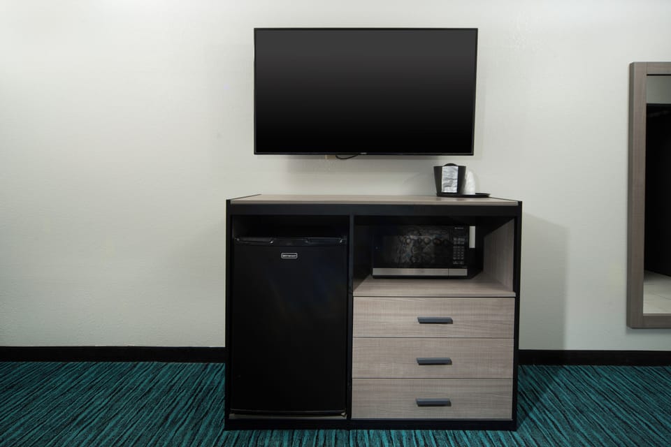 Down comforters, desk, laptop workspace, blackout drapes