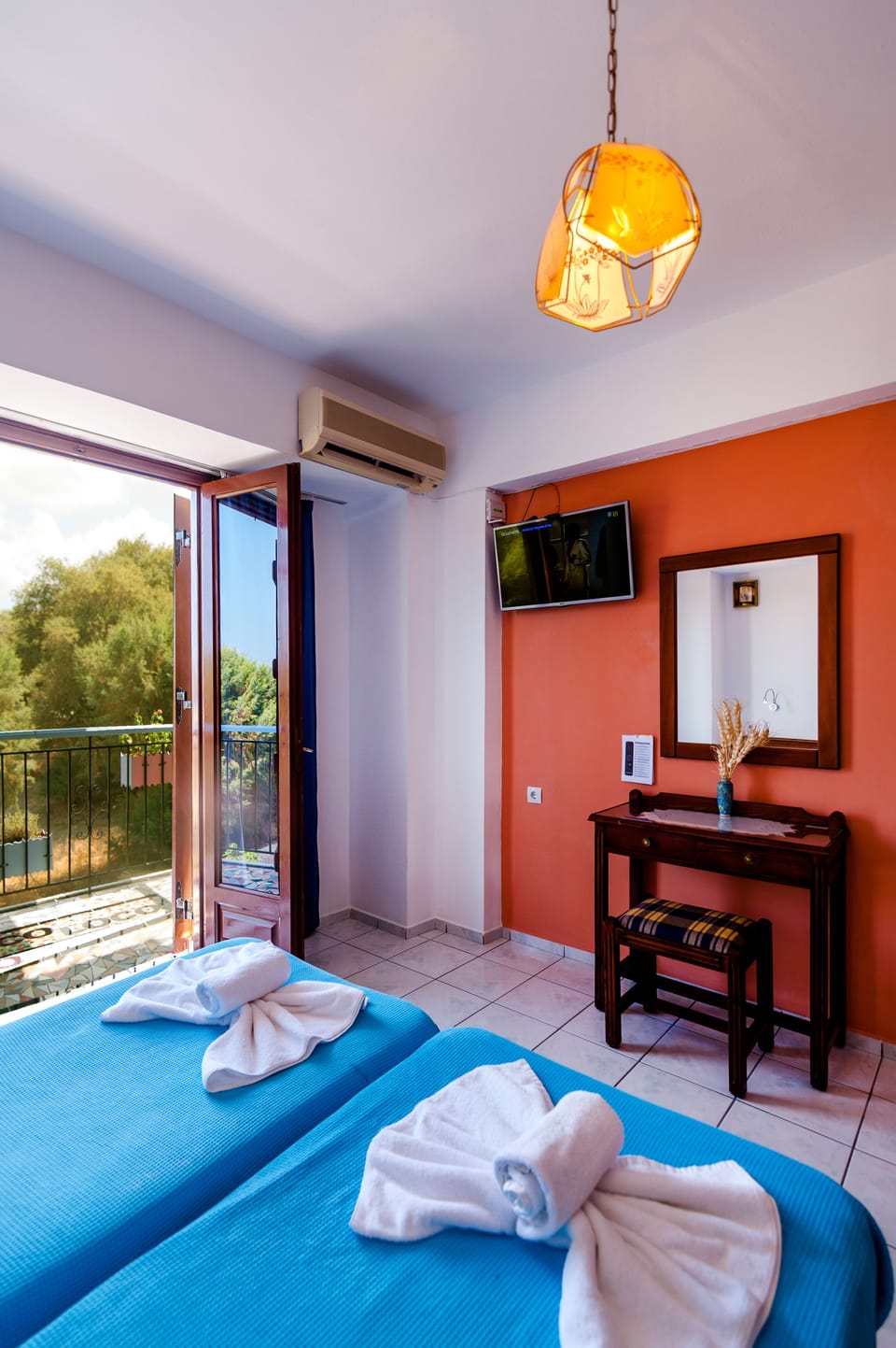 Triple Room, Sea View | In-room safe, desk, laptop workspace, iron/ironing board