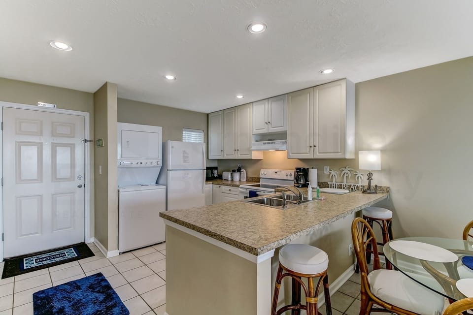 Condo, 2 Bedrooms | Private kitchen | Microwave, oven, dishwasher, coffee/tea maker