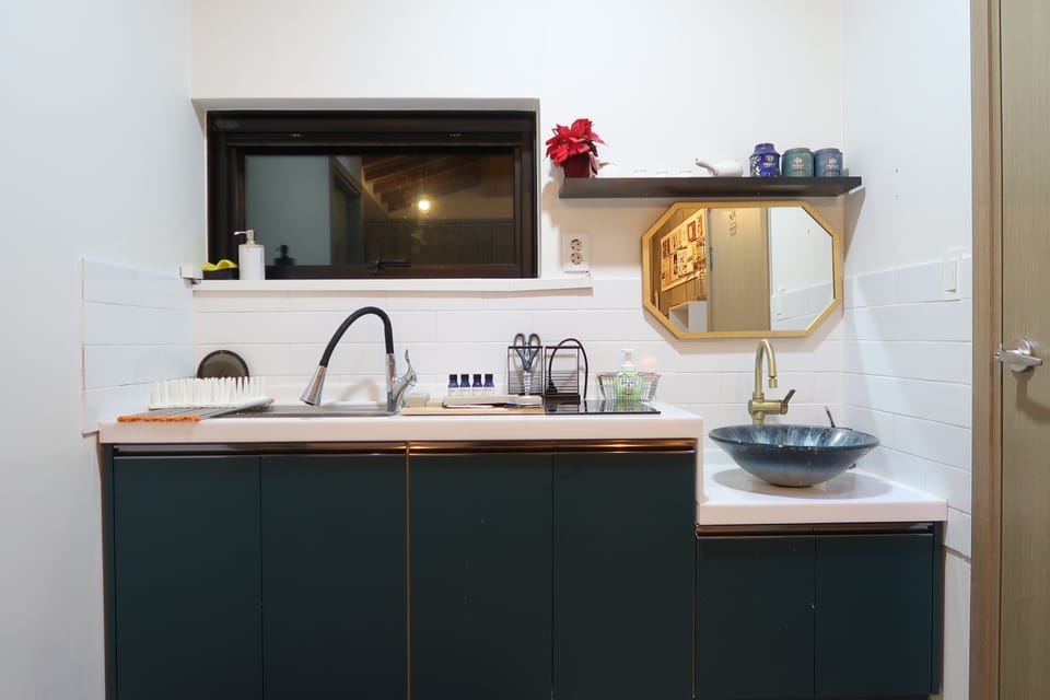 Premium Quadruple Room, 1 Bedroom, Kitchenette, Hill View | Premium bedding, blackout drapes, soundproofing, free WiFi