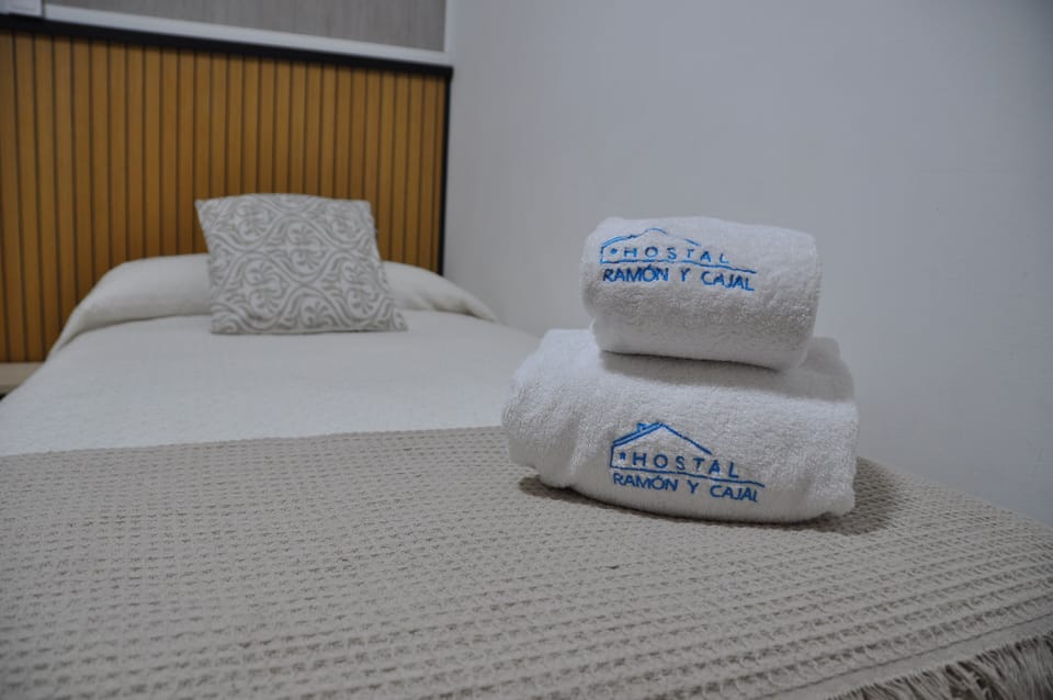 Twin room with private sink | Down comforters, Select Comfort beds, desk, laptop workspace