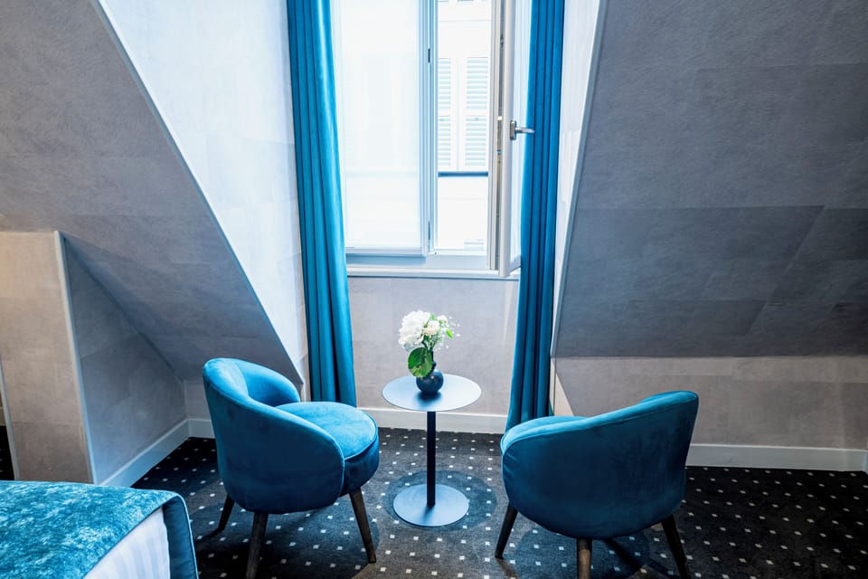 Superior Accommodation on Upper Floor - City View | Living area | 32-inch flat-screen TV with satellite channels, TV