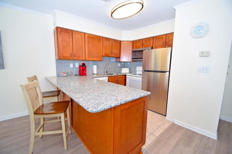 Condo, 2 Bedrooms | Private kitchen | Fridge, microwave, oven, dishwasher