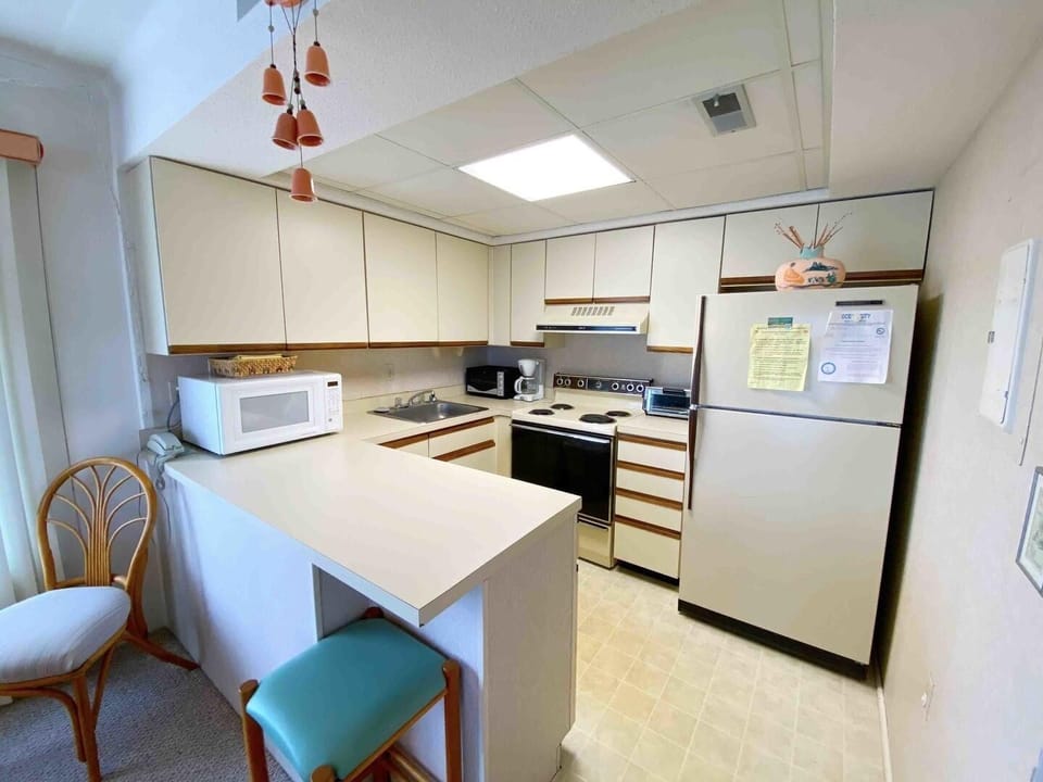 Condo, 1 Bedroom | Private kitchen | Full-size fridge, microwave, oven, stovetop