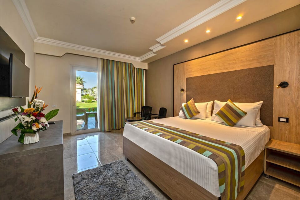 Family Room, 2 Bedrooms, Garden View | Minibar, in-room safe, desk, soundproofing