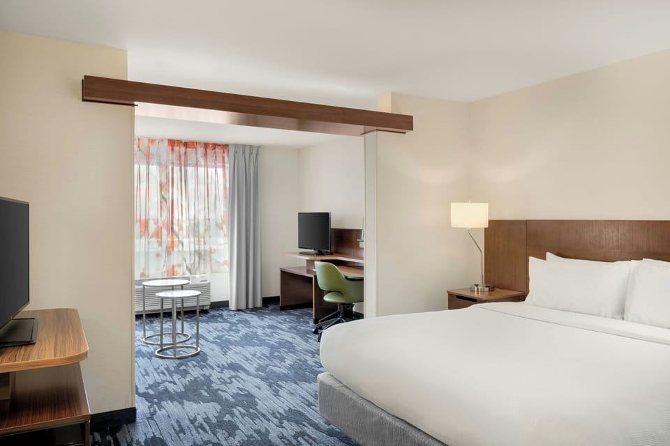 Pillowtop beds, desk, laptop workspace, blackout drapes