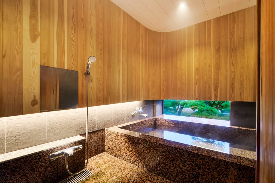 Eco-friendly toiletries, hair dryer, slippers, towels