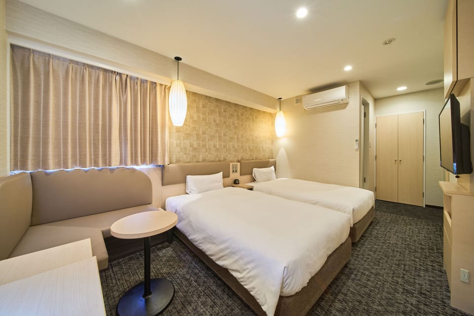 Standard Twin Room, Non Smoking | Down comforters, blackout drapes, iron/ironing board, free WiFi