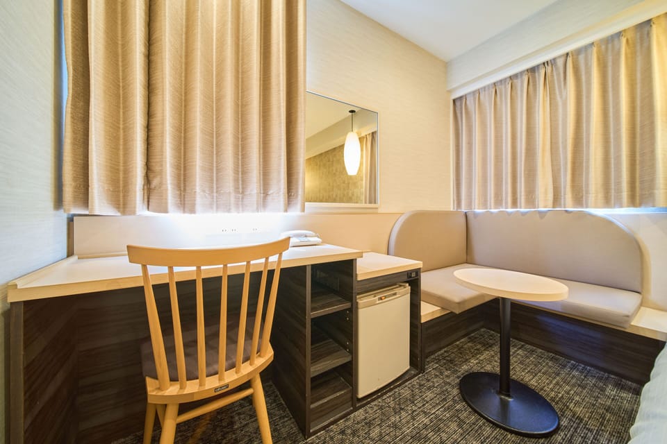 Standard Twin Room, Non Smoking | Down comforters, blackout drapes, iron/ironing board, free WiFi