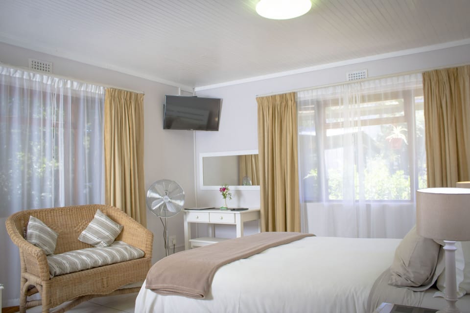 Standard Double Room, Garden View | Down comforters, individually decorated, individually furnished