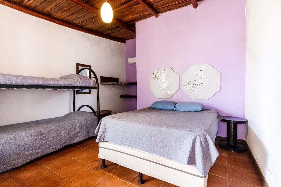 Standard Quadruple Room, Pool View | Blackout drapes, free WiFi, bed sheets
