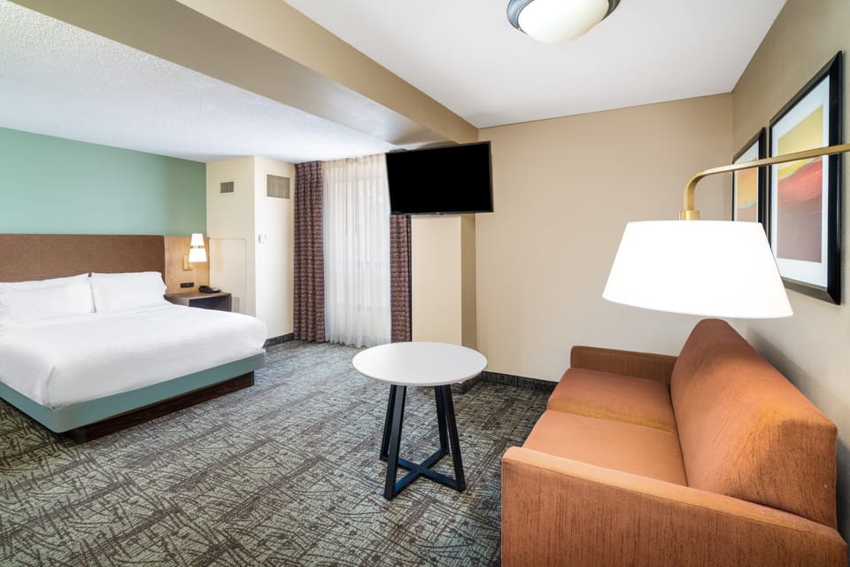 Studio Suite, 1 Queen Bed, Accessible, Kitchen (Communications) | Blackout drapes, iron/ironing board, free cribs/infant beds, free WiFi