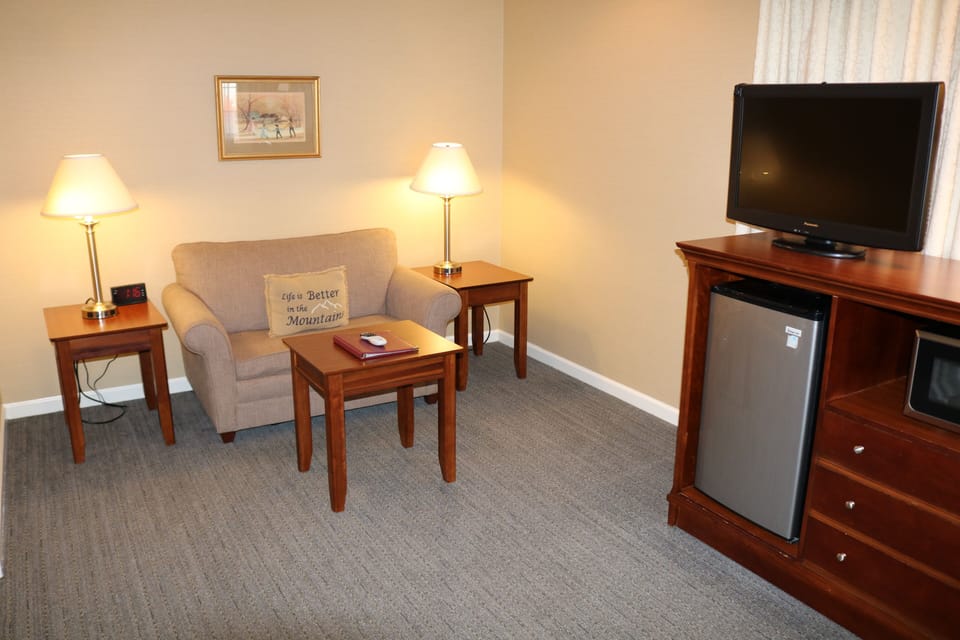32-inch flat-screen TV with satellite channels, TV