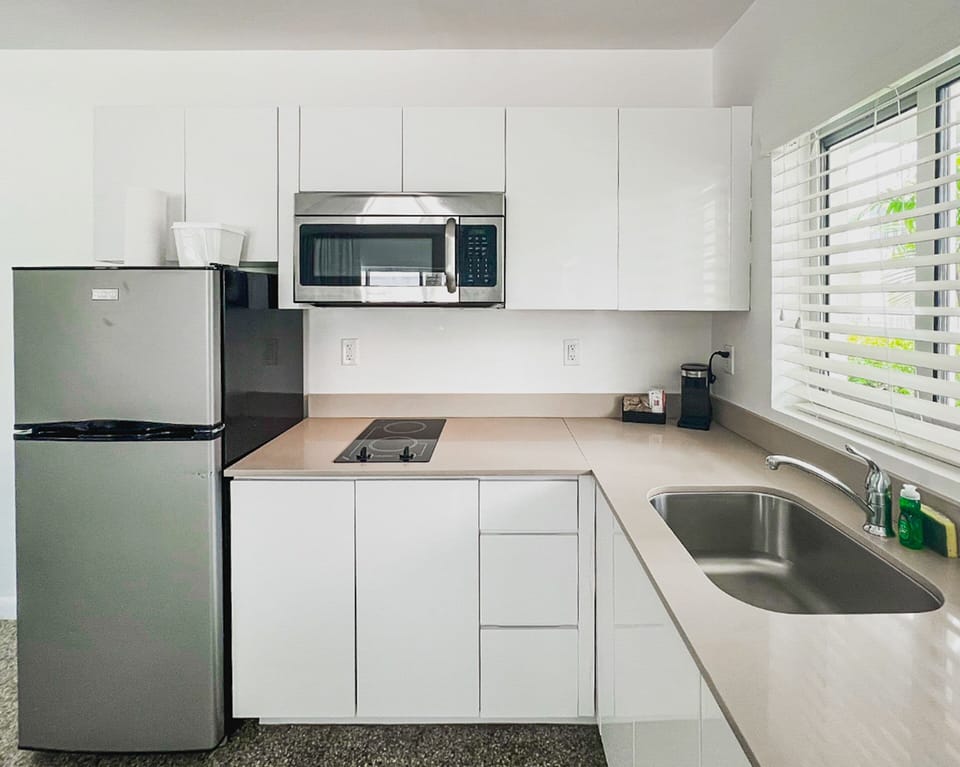 Deluxe Studio, 2 Queen Beds | Private kitchen | Fridge, microwave, coffee/tea maker, paper towels