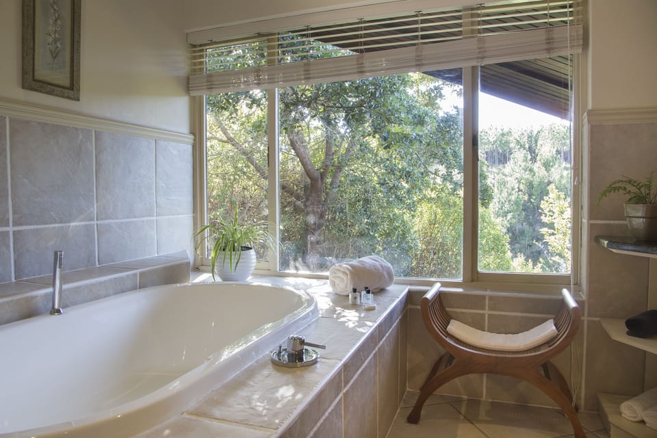 Luxury Lodge Garden Room No View | Bathroom | Separate tub and shower, deep soaking tub, hair dryer, bathrobes