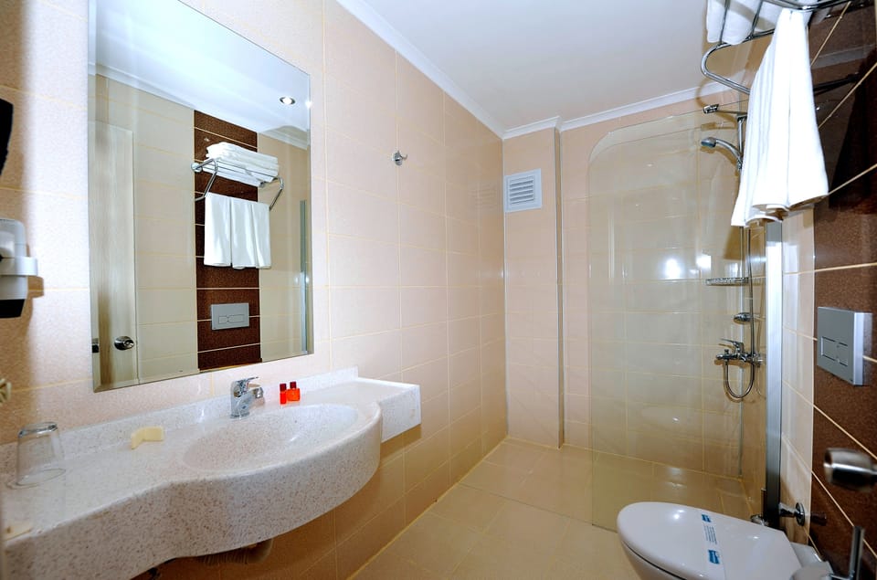 Shower, free toiletries, hair dryer, towels