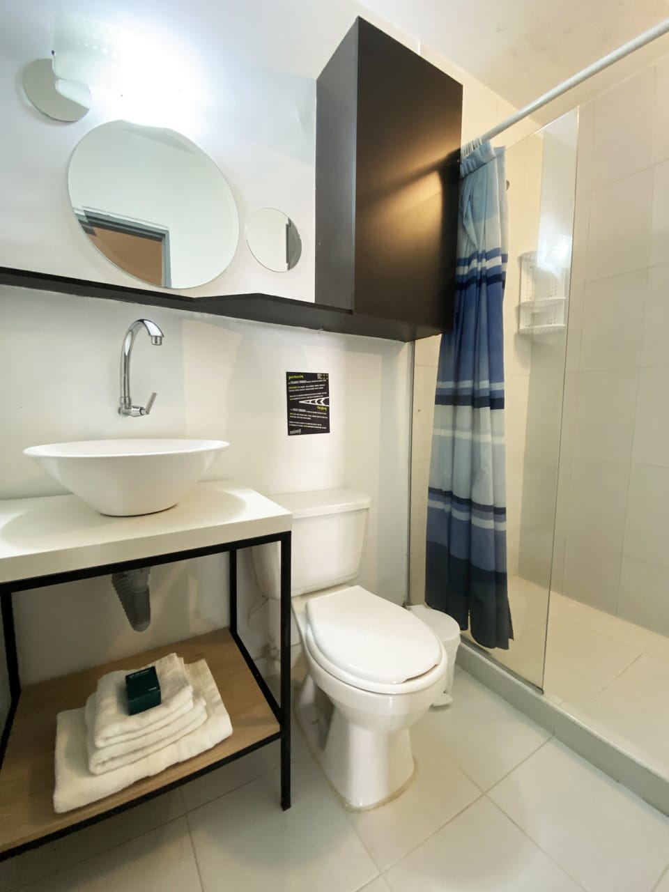 Shower, designer toiletries, bathrobes, towels