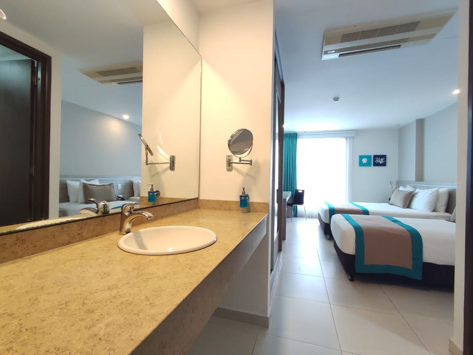 Family Triple Room | Bed sheets