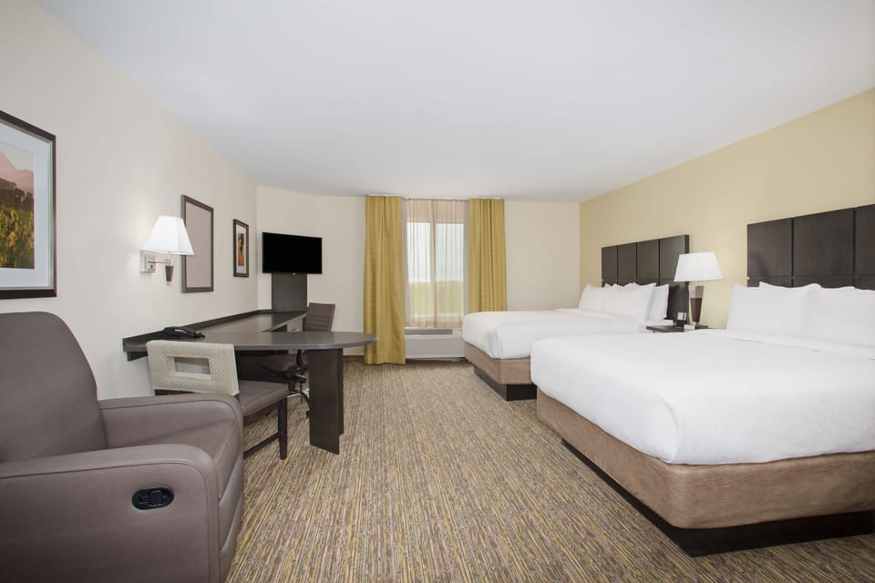 Premium bedding, down comforters, desk, blackout drapes