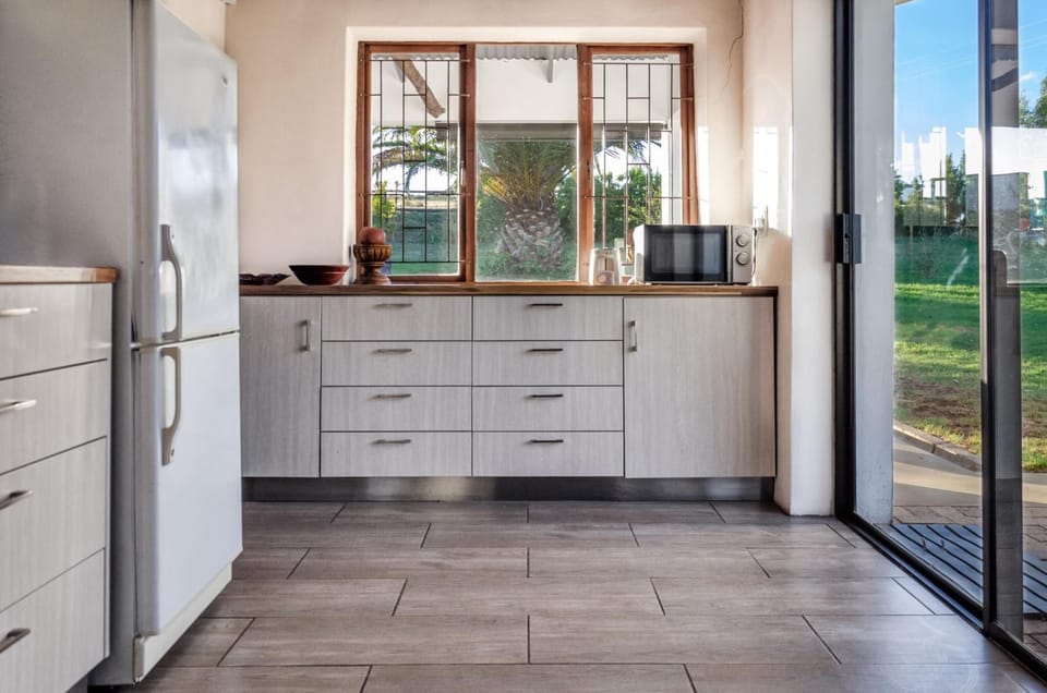 Fridge, stovetop, coffee/tea maker, cookware/dishes/utensils