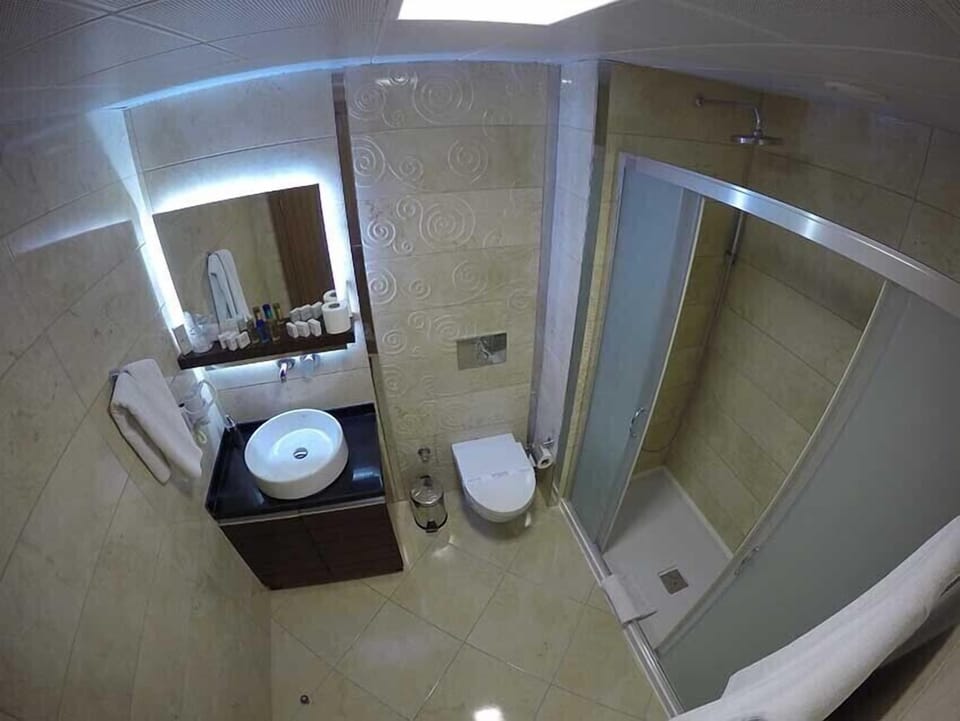 Shower, free toiletries, hair dryer, slippers