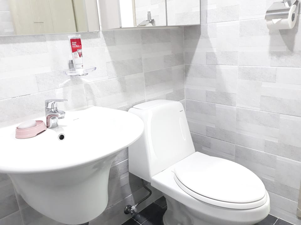 Shower, free toiletries, hair dryer, slippers
