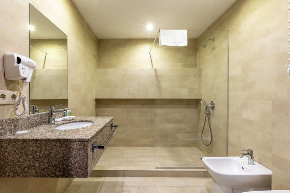 Studio | Bathroom | Free toiletries, hair dryer, bathrobes, slippers