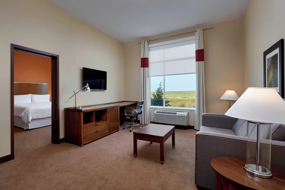 Executive Suite, 1 Bedroom | Premium bedding, pillowtop beds, in-room safe, desk