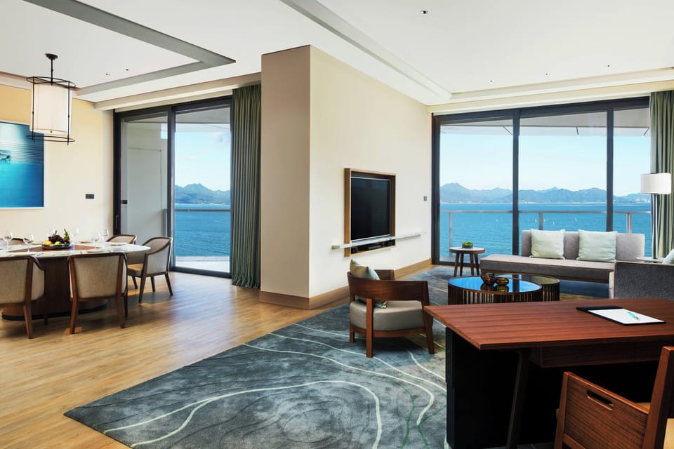 Suite, 1 King Bed, Oceanfront | Living room | LCD TV