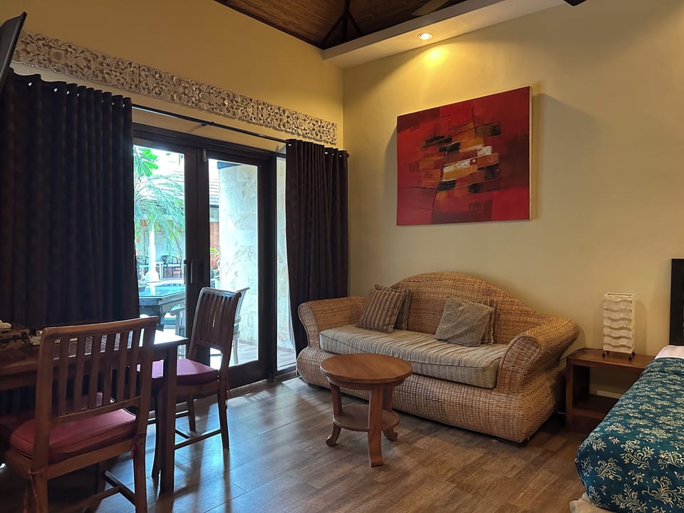 Bungalow, Garden View | Minibar, in-room safe, desk, cribs/infant beds