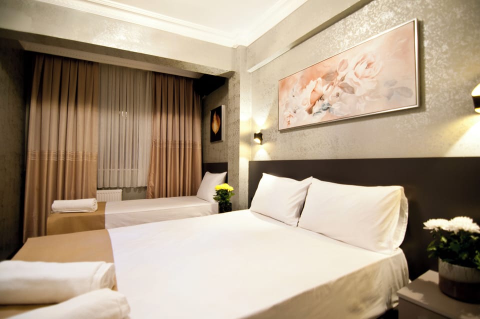 Classic Triple Room | Premium bedding, minibar, iron/ironing board, free WiFi