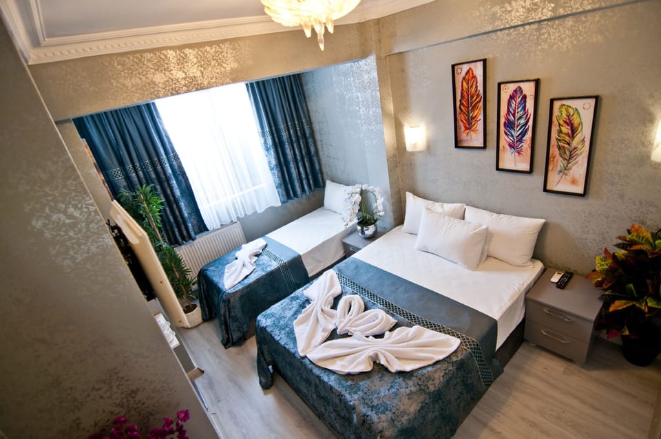 Classic Triple Room | Premium bedding, minibar, iron/ironing board, free WiFi