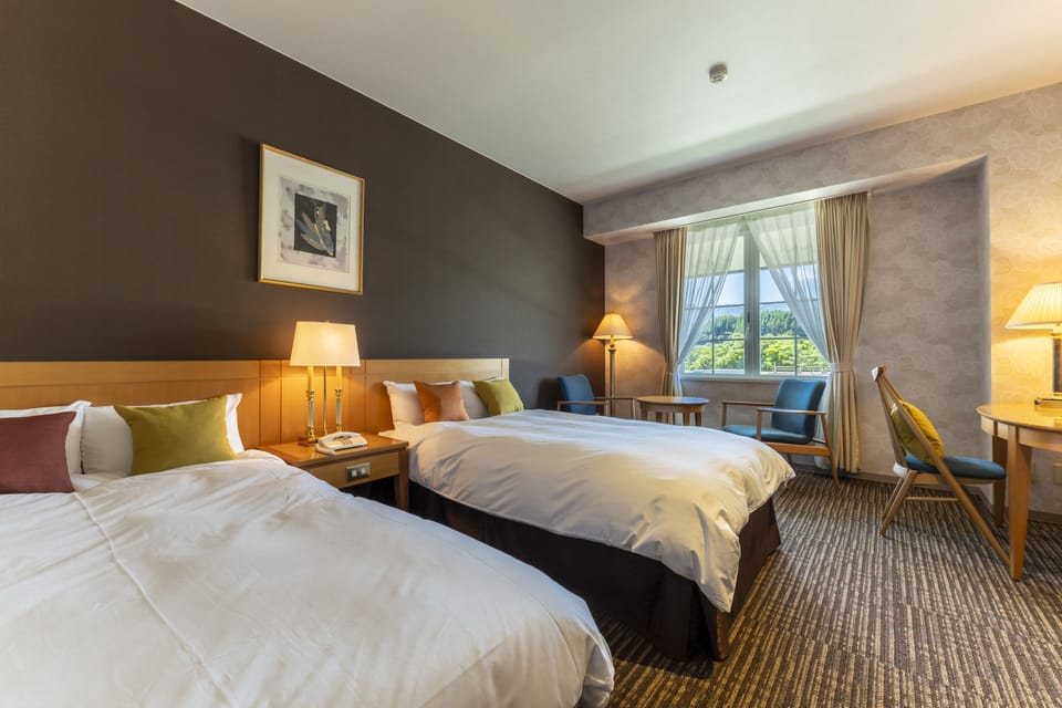 Standard Twin Room | Down comforters, minibar, desk, free cribs/infant beds