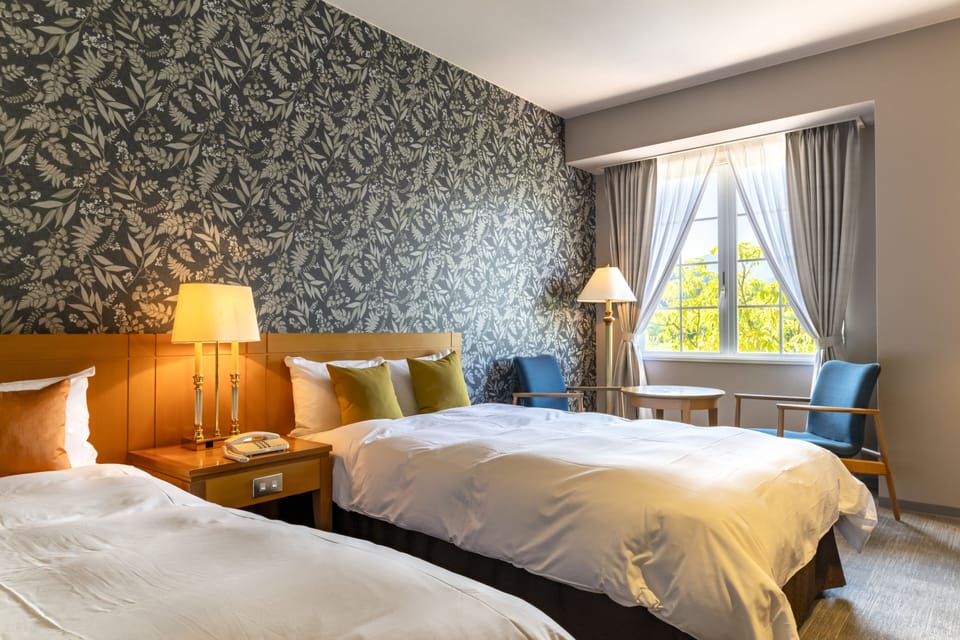 Standard Twin Room | Down comforters, minibar, desk, free cribs/infant beds