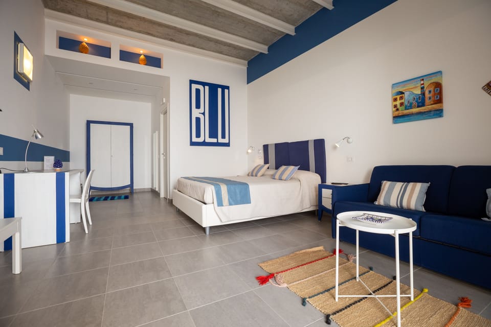 Family Quadruple Room | Minibar, in-room safe, desk, free WiFi