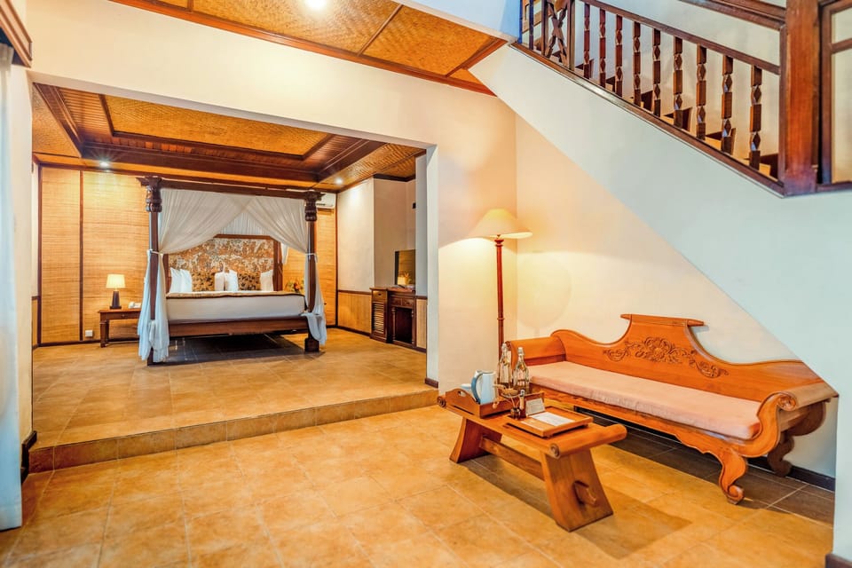 Standard Villa, 2 Bedrooms, Garden Area | Minibar, blackout drapes, soundproofing, iron/ironing board