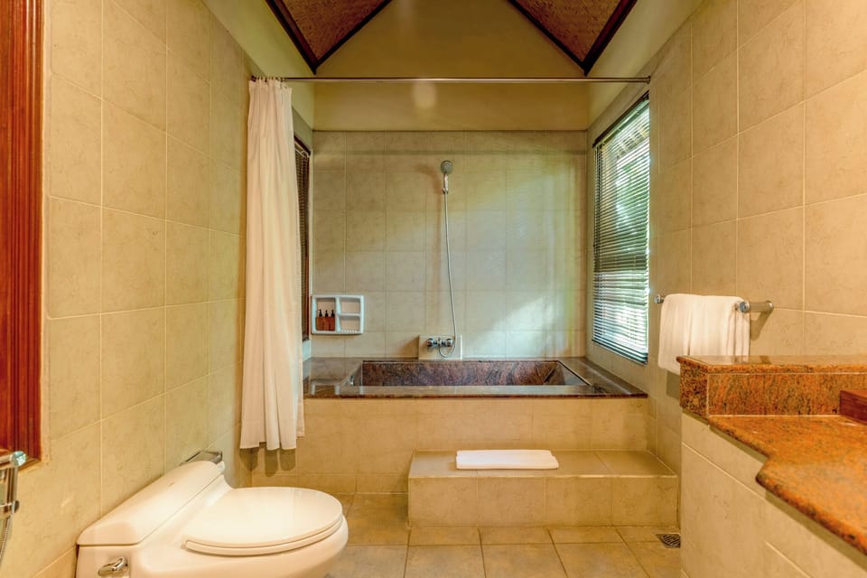 Superior Villa, 2 Bedrooms, Garden Area | Bathroom | Separate tub and shower, deep soaking tub, rainfall showerhead