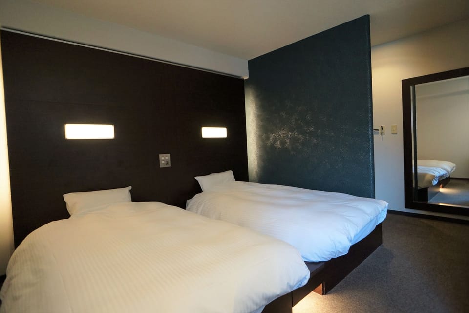 Down comforters, desk, free WiFi, bed sheets