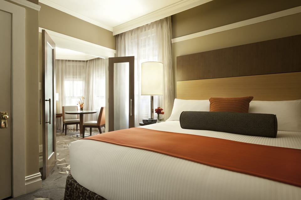 Deluxe Suite, 1 King Bed | Hypo-allergenic bedding, in-room safe, desk, laptop workspace