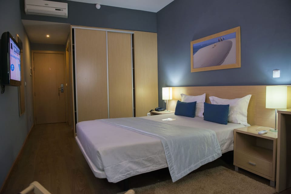 Standard Single Room | 1 bedroom, minibar, desk, blackout drapes