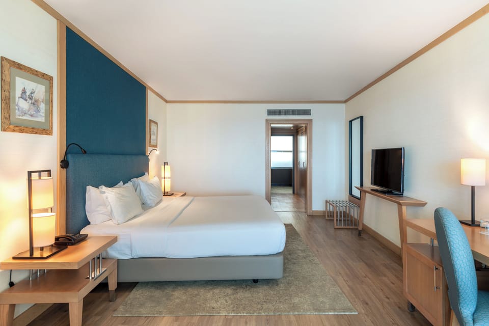 Premium Deluxe Room, Ocean View | Minibar, in-room safe, desk, blackout drapes
