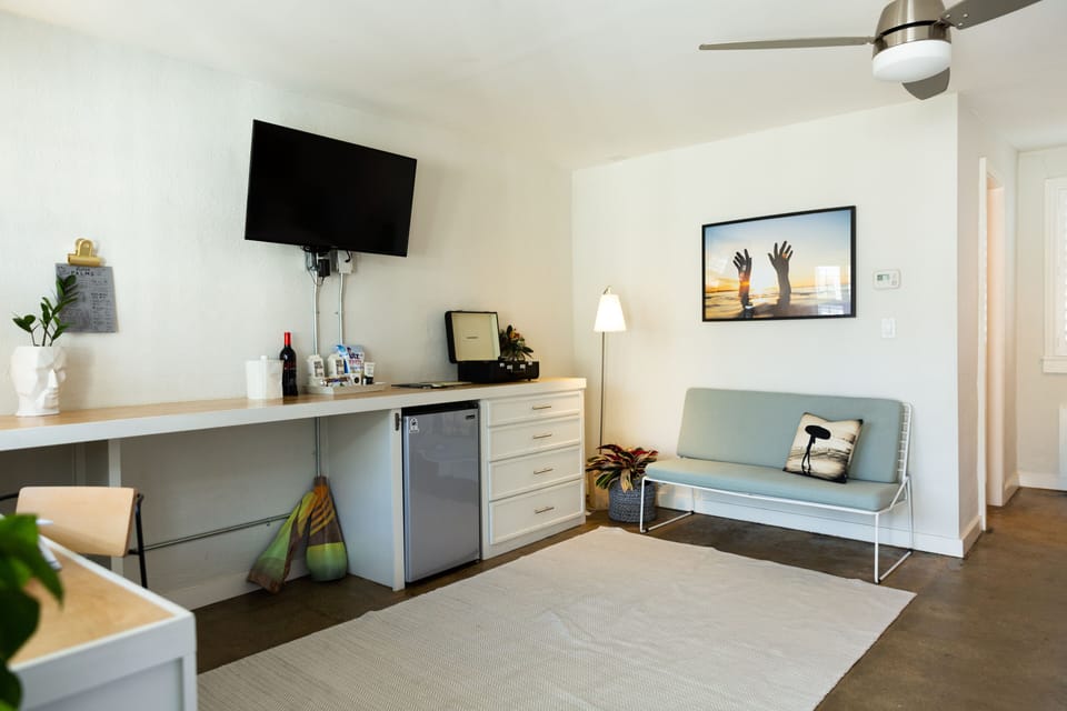 Standard Room, 2 Queen Beds, Non Smoking | Living area | 32-inch Smart TV with cable channels, TV