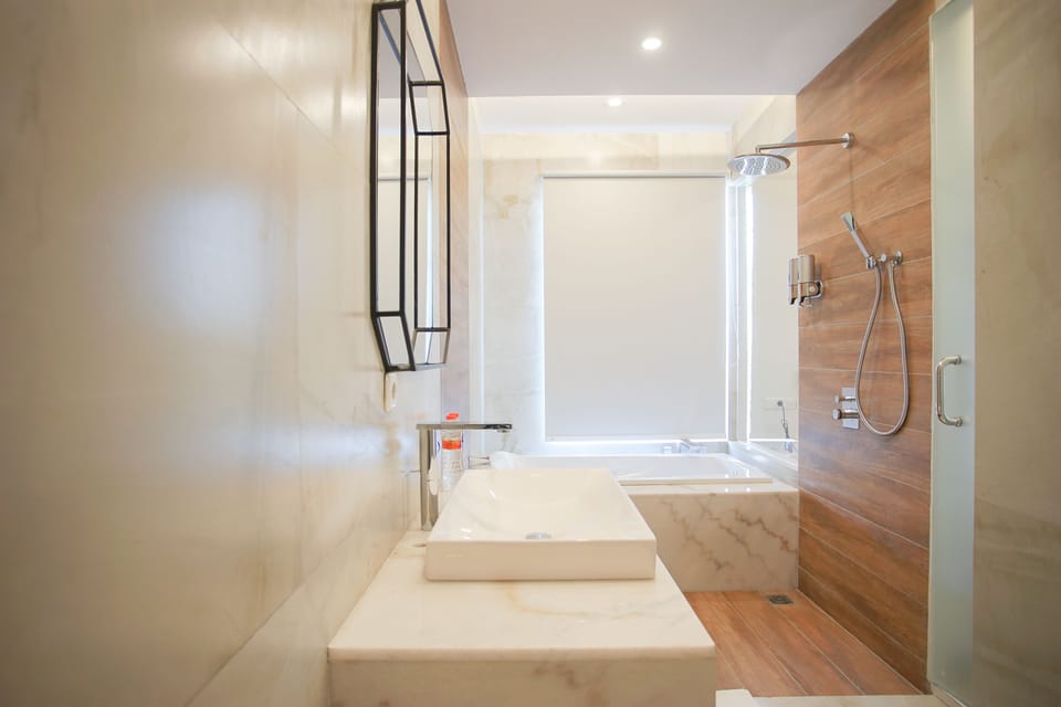 Shower, free toiletries, hair dryer, slippers