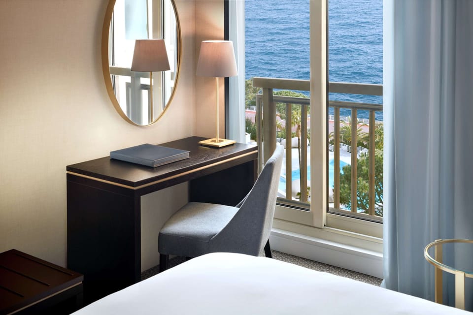 Premium bedding, down comforters, minibar, in-room safe