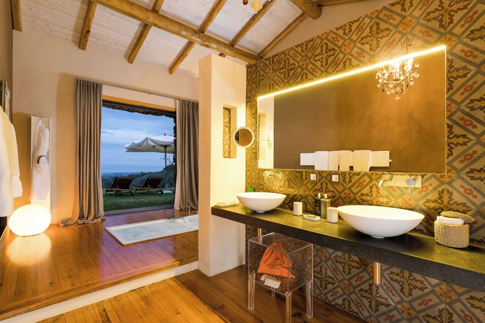 Pool Villa | Bathroom | Rainfall showerhead, designer toiletries, hair dryer, bathrobes