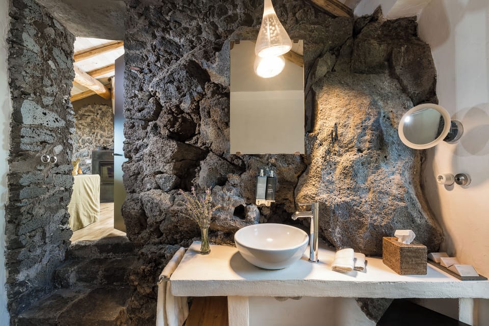Rainfall showerhead, designer toiletries, hair dryer, bathrobes
